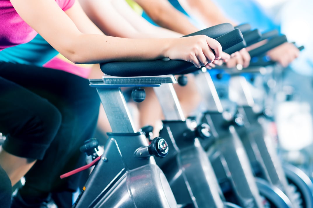 Fitness Group Indoor Bicycle Cycling in Gym